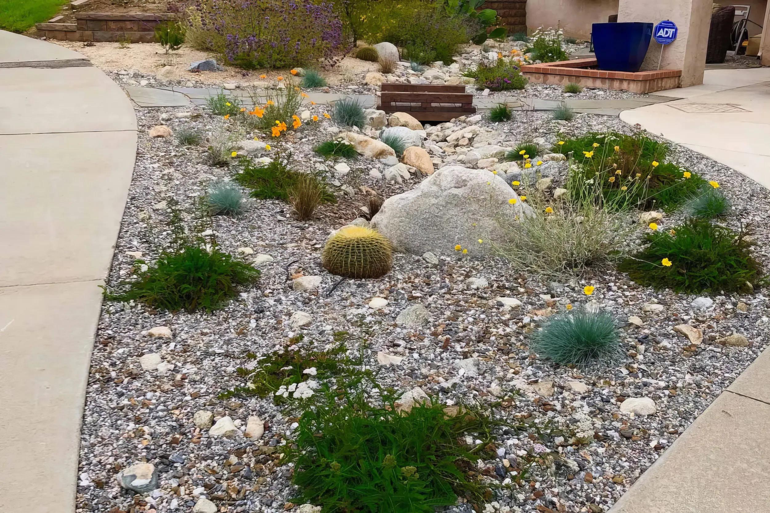 Noncombustible gravel and separated low planting near a foothill home